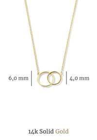 Collier délicat en or massif 14 carats avec deux cercles entrelacés, l'un de 6 mm et l'autre de 4 mm de diamètre, sur une fine chaîne en or.