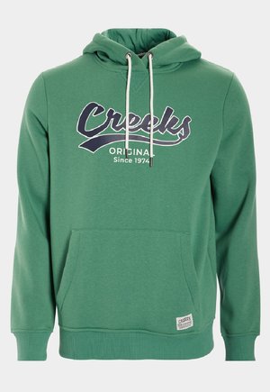 Felpa verde realizzata in tessuto morbido, con tasca frontale, cappuccio con coulisse e grafica "Creeks Original Since 1974" in blu navy.