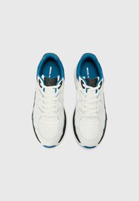 White athletic shoes with a mesh and synthetic upper, blue accents, black outsole, and textured detailing on the tongue and collar.