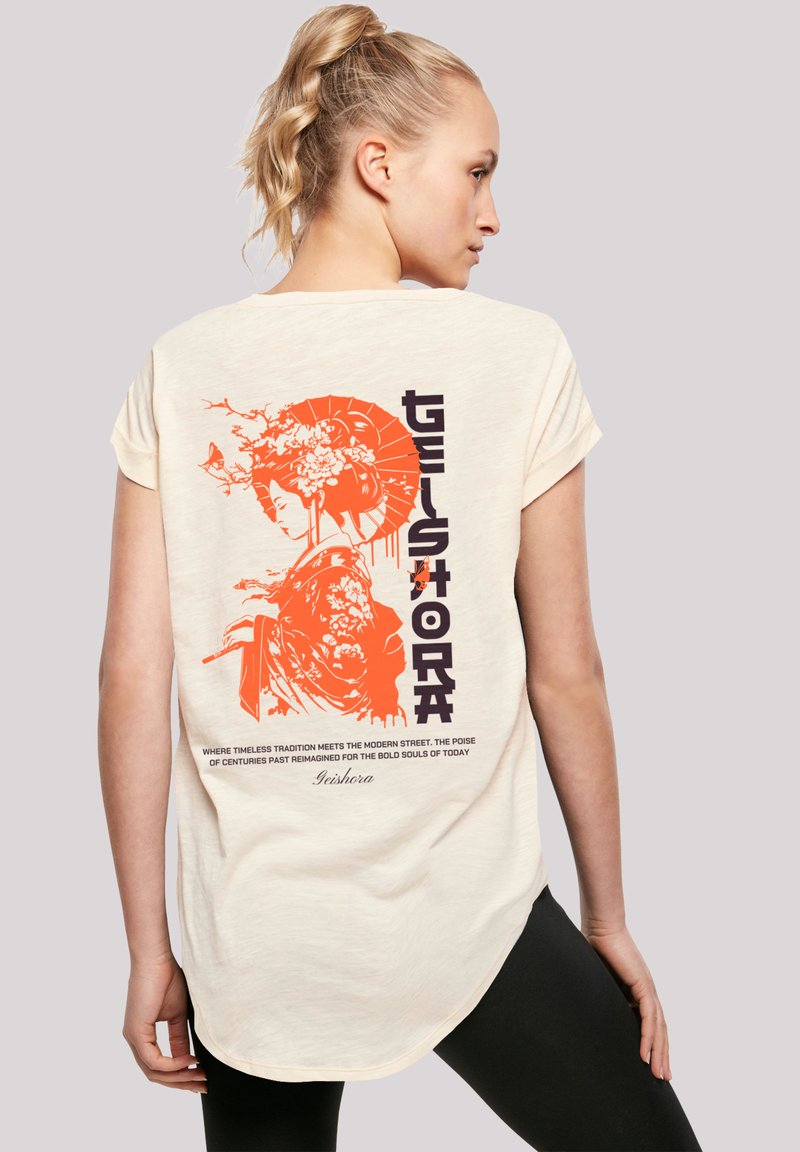 Cream short-sleeve t-shirt featuring a vibrant orange geisha graphic and text on the back, with a relaxed fit and rounded hem.