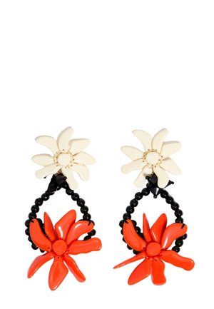 Plastic flower earrings with white and red petals, black bead accents, and a layered design featuring a glossy finish.