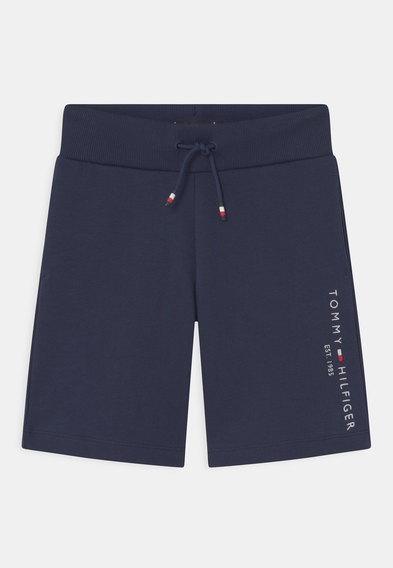 Shorts bleu marine en tissu doux, avec une taille côtelée et un cordon de serrage réglable, ainsi qu'un logo imprimé sur le côté.