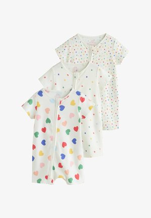 Tri biele krátke detské overalové tričká s prednými zipsami, zdobené farebnými srdiečkami, malými kvetmi a viacfarebnými bodkami.