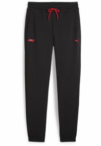 Sorte sweatpants med snøre i taljen, røde detaljer og lommer. Har et rødt logo på venstre lår og elastiske manchetter ved anklerne.