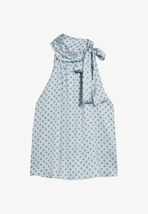 Light blue sleeveless blouse with a tied neckline, featuring a repeating geometric pattern in darker shades. Smooth fabric with a relaxed fit.