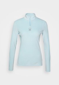 Pullover azzurro chiaro a maniche lunghe con colletto a zip, caratterizzato da un piccolo logo a ragno in strass al centro. Tessuto morbido.