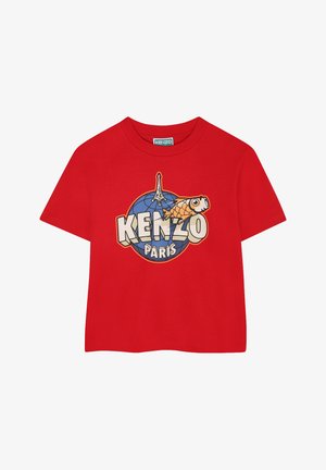 T-shirt en coton rouge avec un grand imprimé graphique « KENZO », un globe et une illustration de la tour Eiffel. Manches courtes et col rond.
