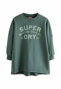 Zeleno oversized pulover iz teksturirane tkanine. Ima drzen bel tisk s napisom "SUPER DRY" v ukrivljenem tisku. Ribani manšeti.