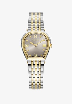 Reloj de pulsera Aigner con pulsera bicolor de plata y oro. Presenta una esfera gris, marcadores de hora dorados y una forma distintiva de lágrima.