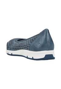 Blue perforated flat shoes made of leather with a rounded toe. Features a white foam sole and textured accents on the heel.