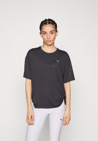 Puma STUDIO TWIST TEE  - Sportfelső - black