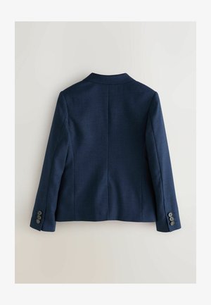 Tamsiai mėlynas švarkas su struktūruota siluetu, išpjauta atvėrimo apykakle ir trijų mygtukų rankogaliais. Pagamintas iš tekstūruotos medžiagos ir pasižymi priderintu kirpimu.