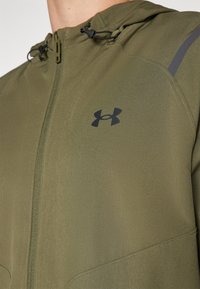 Under Armour UNSTOPPABLE JACKET - Outdoorová bunda - marine/green/black
