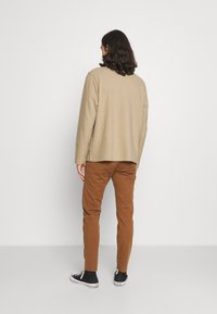 Levi's® Chinos - toffee