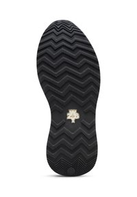 Suola di scarpa in gomma nera che presenta un motivo di battistrada a zigzag e un accento del logo bianco al centro. Etichetta circolare delle dimensioni sul fondo.