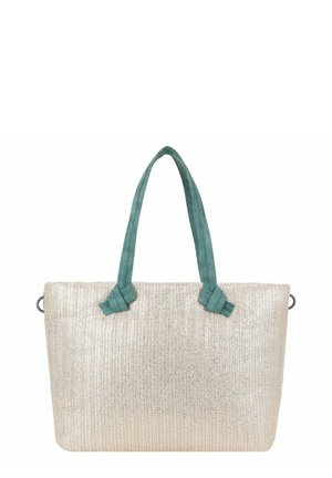 Sac fourre-tout beige tissé avec de larges poignées en tissu bleu sarcelle fixées par des nœuds, forme rectangulaire et anneaux métalliques sur les côtés.