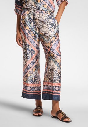 CROPPED STAMPATI - Pantaloni - blu