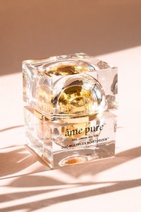 Quadratischer Glasbehälter mit einem goldenen Kuppelverschluss, aus klarem Material, minimalistischem Design und einem schwarzen Textetikett, das Duo-Multiplex Feuchtigkeitscreme (50 ml) enthält.