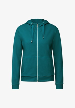 Felpa con zip di colore verde turchese, realizzata in tessuto testurizzato, con cordini regolabili, tasche frontali e polsini a costine. Chiusura con zip e cappuccio completo.