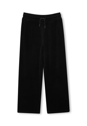 Zwarte wijde sweatpants gemaakt van zachte, fluwelen stof. Voorzien van een elastische tailleband, trekkoord en zijzakken. Gladde textuur.