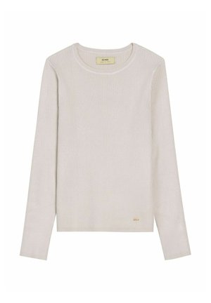 Kremowa prążkowana koszula z długim rękawem i okrągłym dekoltem oraz małym złotym logo na dolnej części przodu, wyłożona płasko na białym tle.