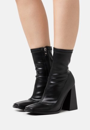 RAID, Bottines à talons hauts - black