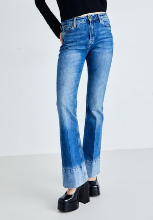 SKINNY FIT FADE - Jean flare - dark-blue denim