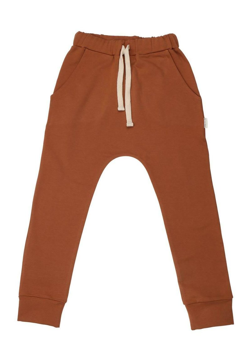 Braune Baumwoll-Jogginghosen mit elastischem Bund, Kordelzug, zwei Seitentaschen und Bündchen an den Knöcheln. Glatte Textur, lockere Passform.