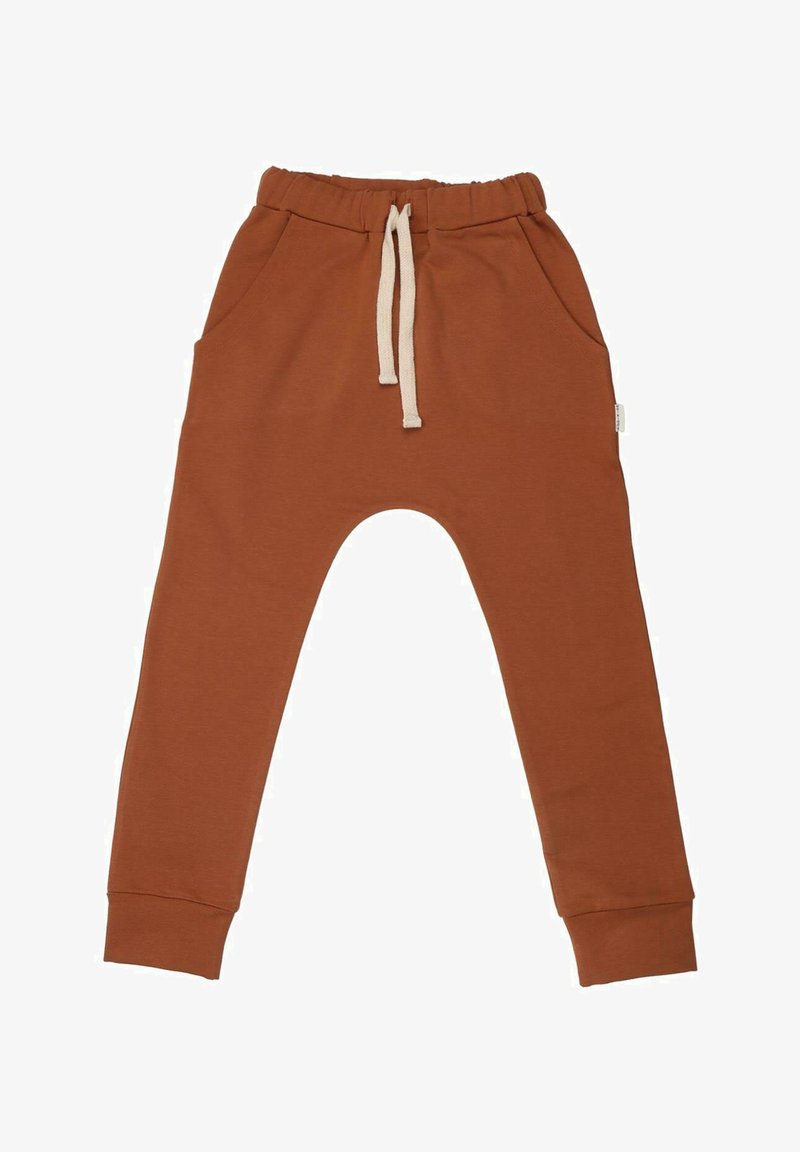 Braune Baumwoll-Jogginghosen mit elastischem Bund, Kordelzug, zwei Seitentaschen und Bündchen an den Knöcheln. Glatte Textur, lockere Passform.