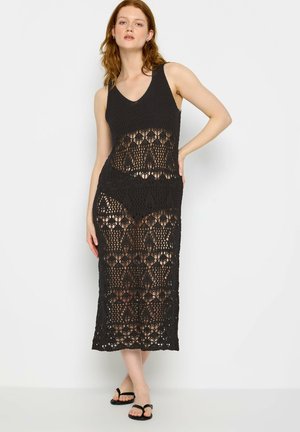 Ranta-asusteet - black