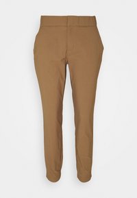 Ruskeat kapea-alahkaiset housut, joissa on joustava vyötärönauha ja sivutaskut. Valmistettu sileästä, joustavasta kankaasta, jossa on räätälöity muotoilu.