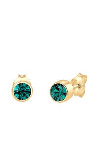 Boucles d'oreilles en or avec des cristaux en cristal turquoise ronds et facettés, présentant une finition polie et un fermoir à tige sécurisé.