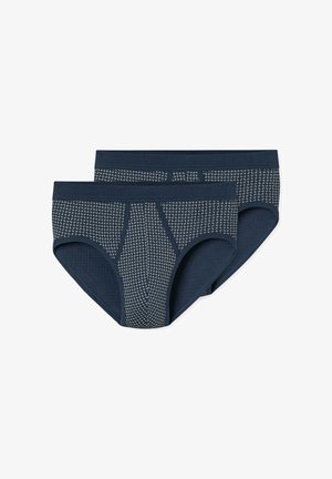 Twee paar marineblauwe herenboxers met een klein wit kruisjespatroon en effen marineblauwe taillebanden, plat neergelegd.