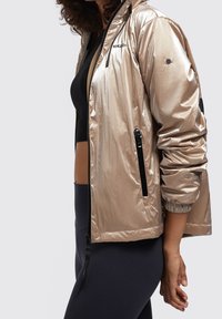 khujo Regenjas - beige