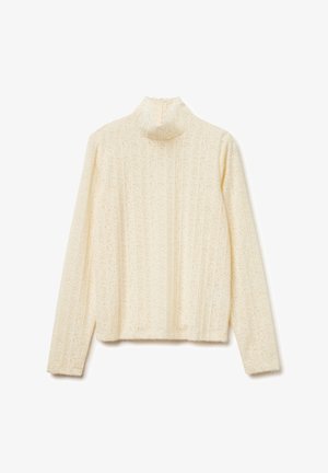 Top de manga larga color crema con cuello cerrado, que presenta un patrón floral texturizado y un diseño de canalé. Cierre de cremallera en la espalda.