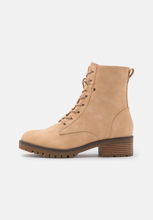 Bottines à lacets - beige