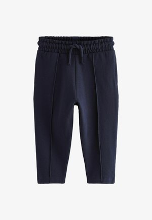 Pantaloni jogger blu navy con tessuto textura, cintura elastica e cordino. Presentano due cuciture verticali sulla parte anteriore per un tocco di dettaglio in più.