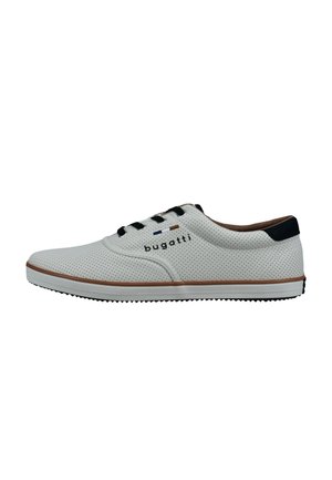 White perforated shoes with black laces and accents. Rubber sole with brown edging and logo on the side. Smooth texture, sporty design.