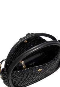 Black woven leather handbag with gold hardware, top handles, and an interior pocket. Features a textured design and rounded shape.