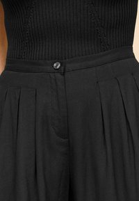 Next SUPERWIDE TALL  - Pantaloni - black