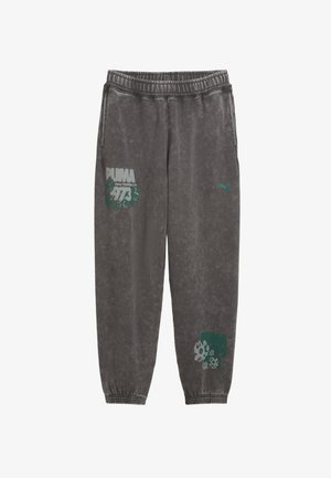 Hallid hallad püksid pehmest kangast, millel on elastne vöökoht. Vasakul reiel on roheline Puma logo ja graafiline trükk. Elastsed mansetid.