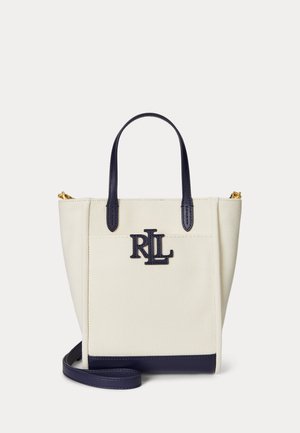 Malá béžová taška na rameno s tmavomodrými koženými rúčkami a základňou, tmavomodré logo "RLL" na prednej strane a odnímateľný tmavomodrý ramenný popruh.