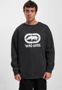 Donkergrijze sweatshirt van een katoenmix, met een witte grafiek van een rhinoceros en de tekst "*eckō unltd." op de voorkant. Regular fit.