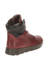 Red and black leather ankle boot with round toe, textured finish, and black collar. Features laces and a thick rubber sole.