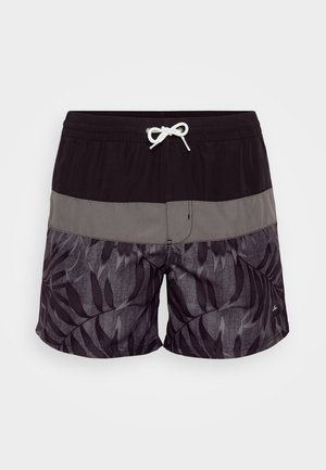 Schwarze Badeshorts mit einem grün-grauen horizontalen Streifen, versehen mit einem Palmenblattmuster in Schwarz und Grau. Elastischer Bund mit Kordelzug.
