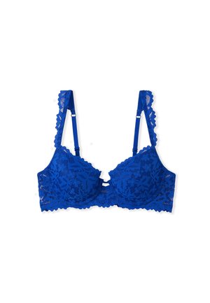 Soutien-gorge en dentelle bleue avec un motif floral, bonnets rembourrés, bretelles réglables et bords festonnés. Présente un détail décoratif au centre.