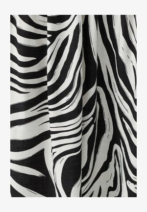 Sort-hvidt stof med zebra-stribemønster, der har dristige, brede linjer og en tekstureret vævning.