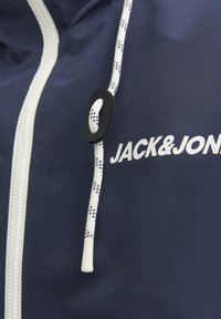Jack & Jones JJERUSH HOOD - Športna jakna/jopica - blau