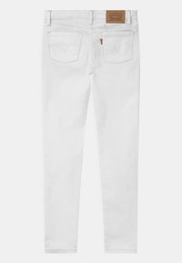 Levi's® 710 SUPER SKINNY FIT - Calças de ganga de corte skinny - white
