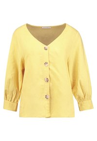 Geel knoopblouse van lichtgewicht stof, met een V-hals, driekwart mouwen en vier decoratieve knopen op de voorkant.